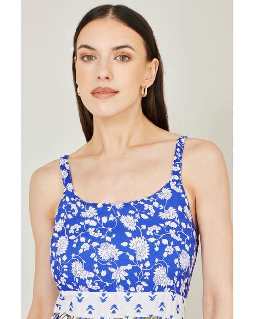 Yumi' White And Rayon Patchwork Print Tiered Maxi Dress