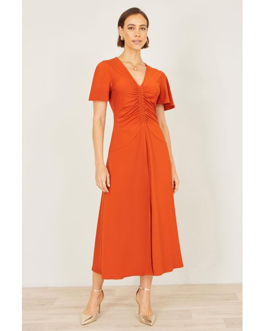 Yumi' Orange Ruched Front Stretch Midi Dress