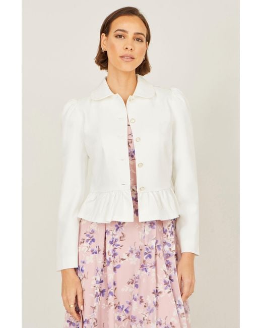 Yumi' White Peplum Fitted Jacket