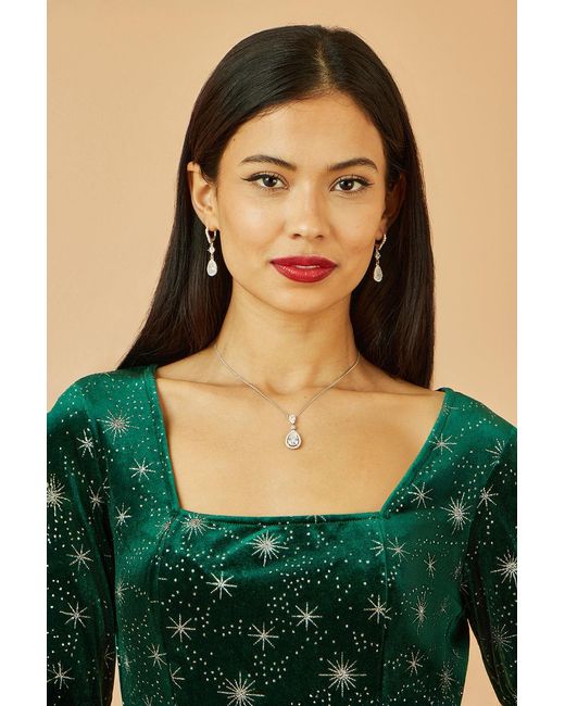 Yumi' Green Starburst Foil Print Long Sleeve Skater Dress