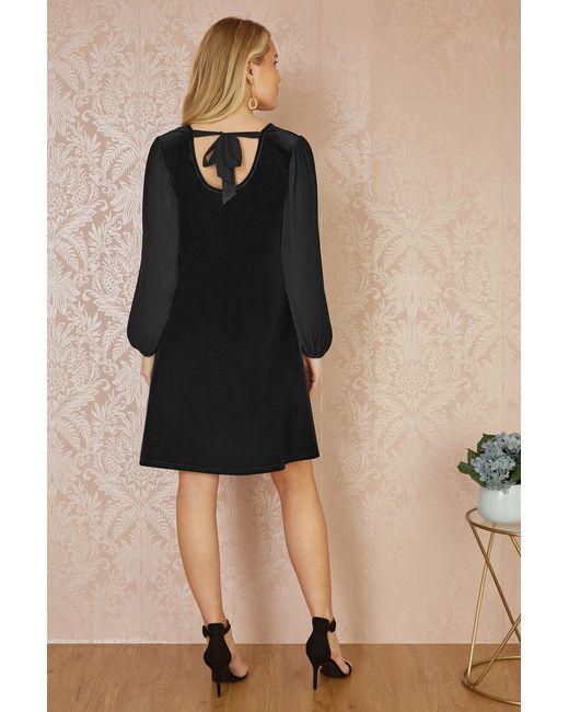 Yumi' Black Velvet Tunic Dress With Pleated Balloon Sleeves And Tie Back