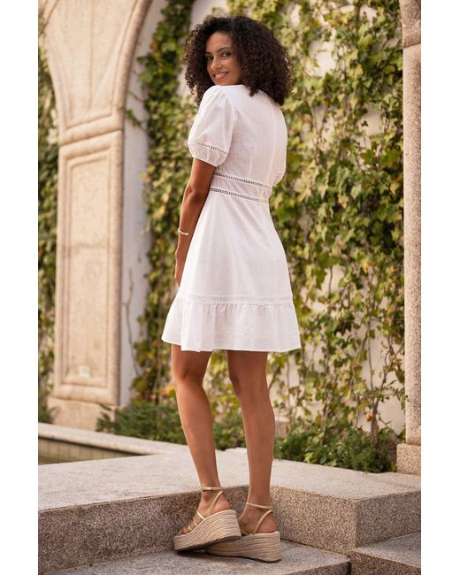 Yumi' White Lace Trim V Neck Dress