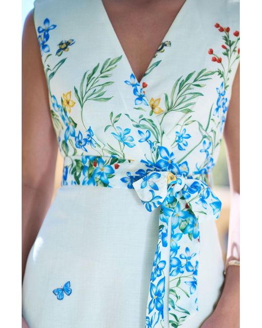 Yumi' Blue Butterfly Print Midi Wrap Dress