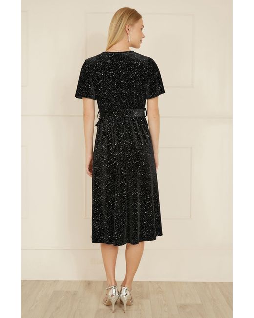 Yumi' Black Velvet Sparkle Wrap Angel Sleeve Dress