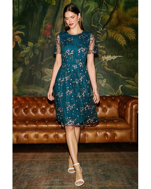 Yumi' Green Embroidered Floral Mesh Prom Dress