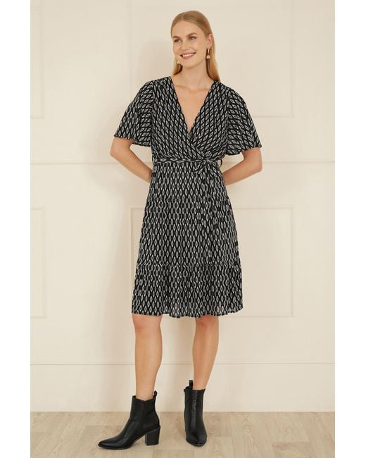 Yumi' Black Geo Print Mesh Stretch Midi Skater Dress