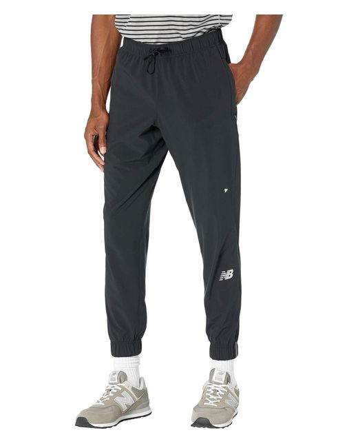 New Balance Synthetic Impact Run Woven Pants in Black for Men - Lyst