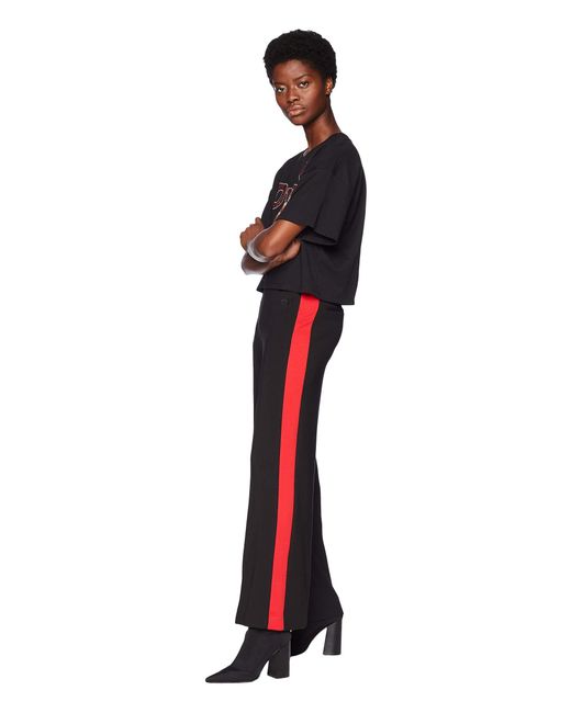 Pants with red side on sale stripe