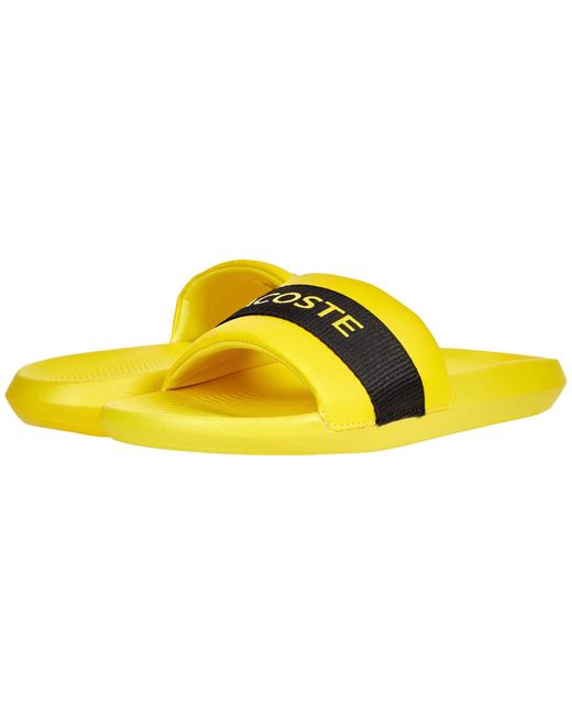 lacoste yellow slides
