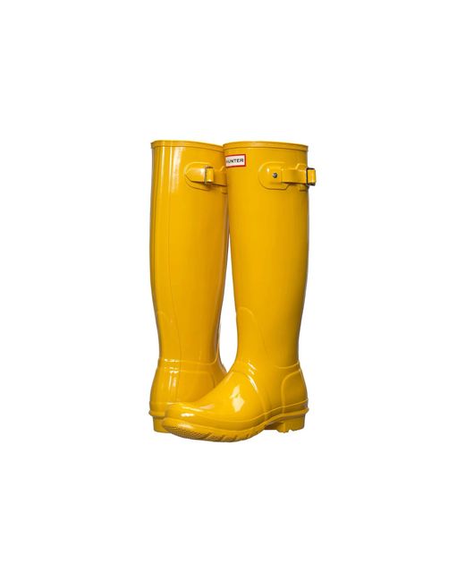 tall yellow rain boots