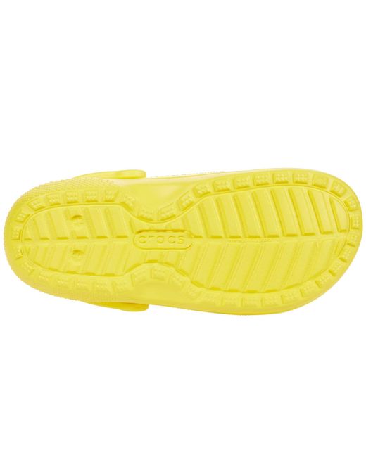 yellow lined crocs