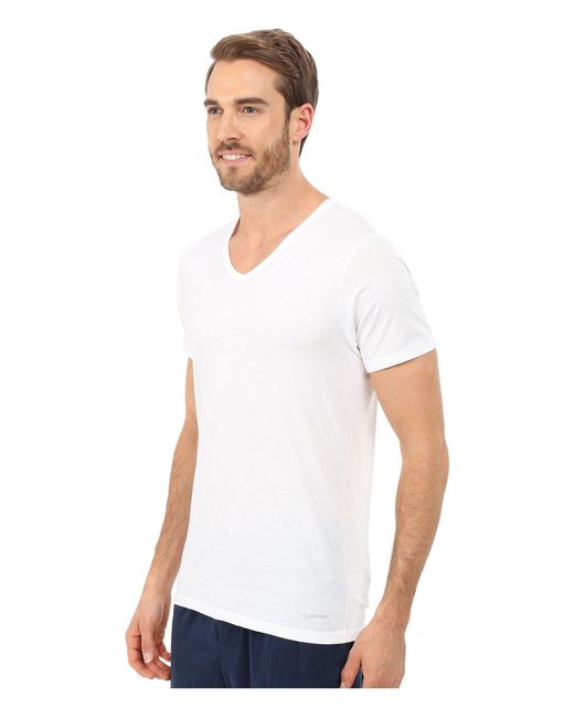 calvin klein jeans ss button v neck fla