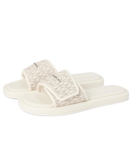 [SALE!!] ★MICHAEL Michael Kors Suki Flat Slide★ サンダル Women's MICHAEL Michael Kors Suki Flat Slide | Zappos.com