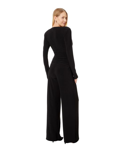 Norma Kamali Black V-neck Long Sleeve Shirred Waist Jumpsuit With Shoulder Pads