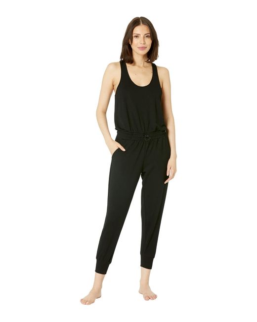DKNY Synthetic Yoga Terry Racerback Jumpsuit in Black | Lyst