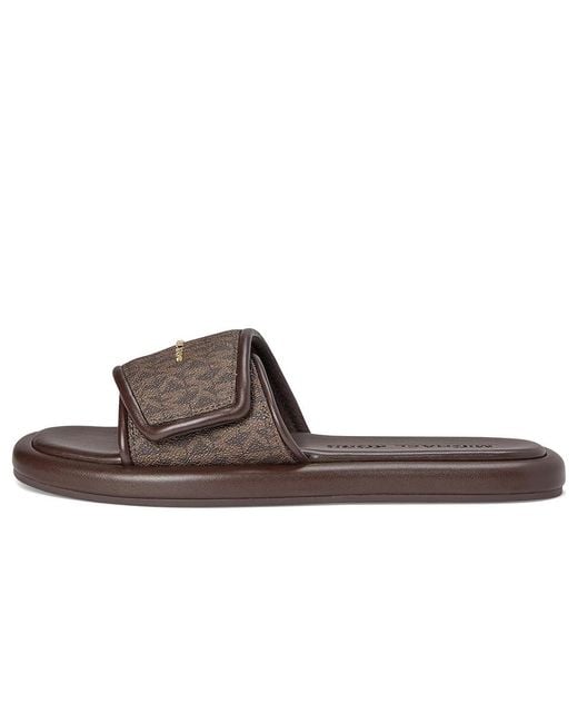 MICHAEL Michael Kors Suki Flat Slide Sandals in Brown | Lyst