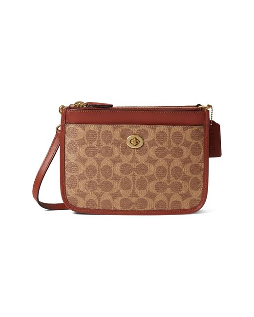 COACH Coated Canvas Signature Slim Turnlock Crossbody in Brown Lyst