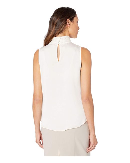 Download Vince Camuto Sleeveless Mock Neck Hammer Satin Blouse in Taupe (White) - Lyst