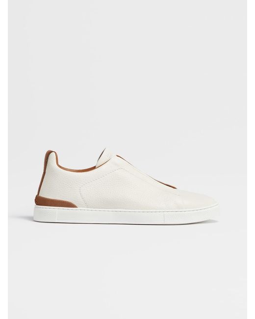 off white deerskin triple stitch sneakers