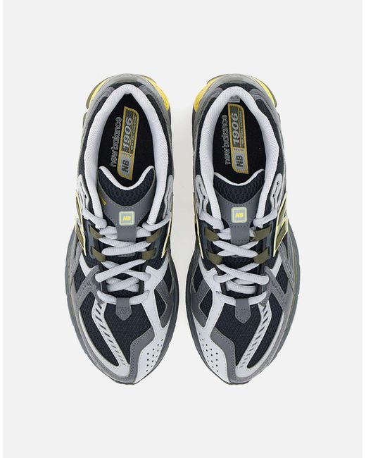 New Balance Gray M1906 Graue Sneakers Mit Gelben Details