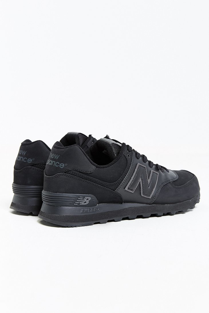 new balance goud zwart