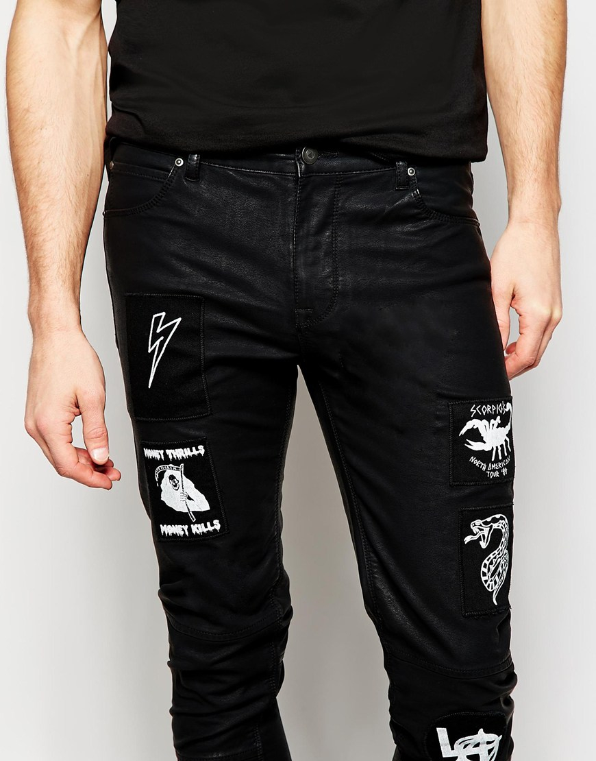 black patched skinny jeans