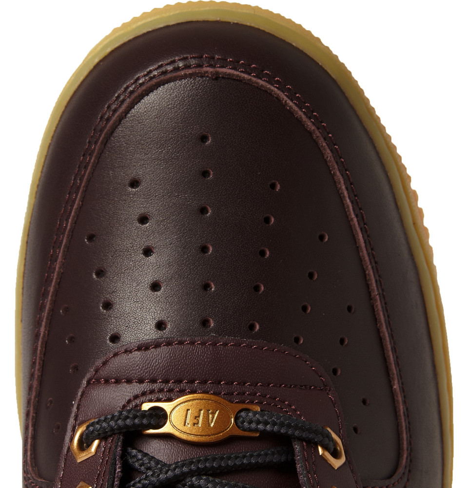 red and brown air force ones