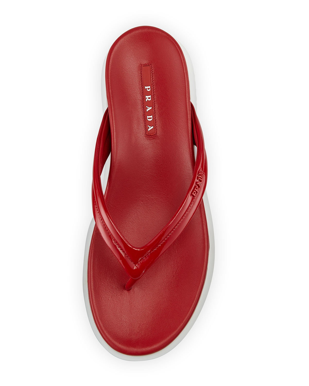 red patent leather flip flops
