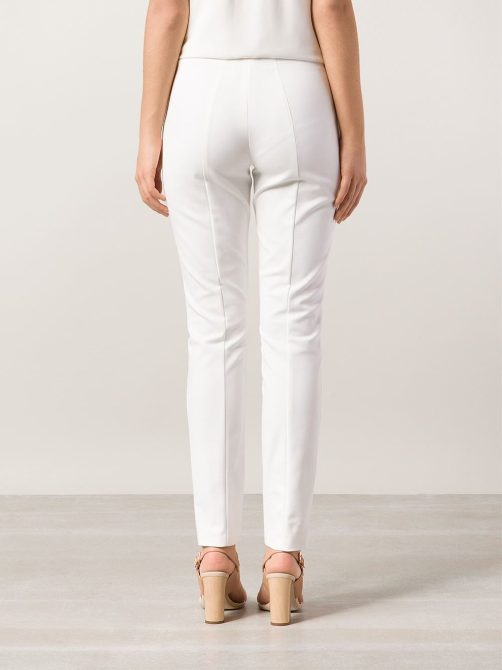 white slim trousers