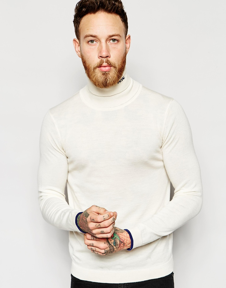 roll neck beige jumper