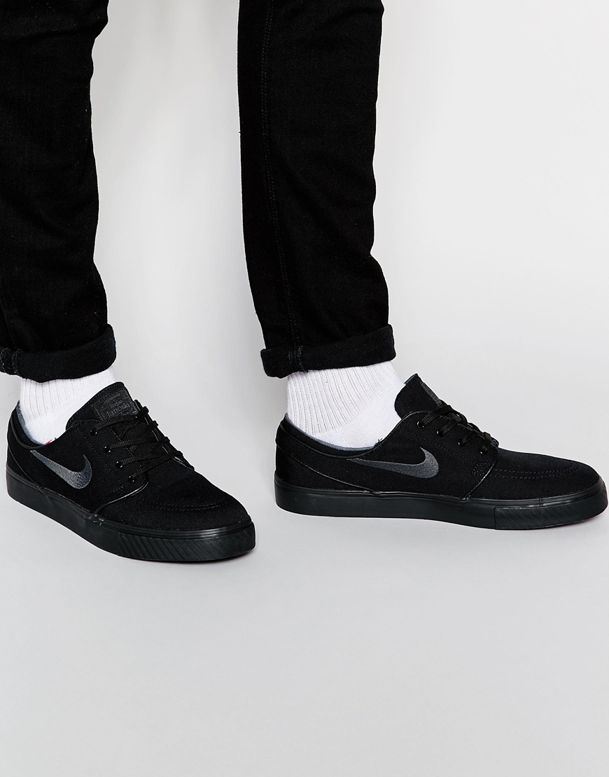 nike janoski triple white