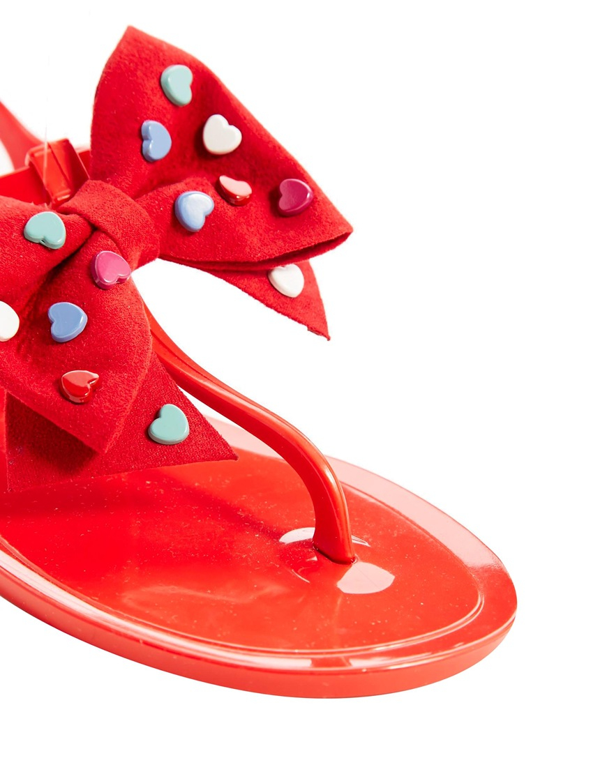 Love moschino Heart Bow Red Jelly Flat Sandals in Red | Lyst