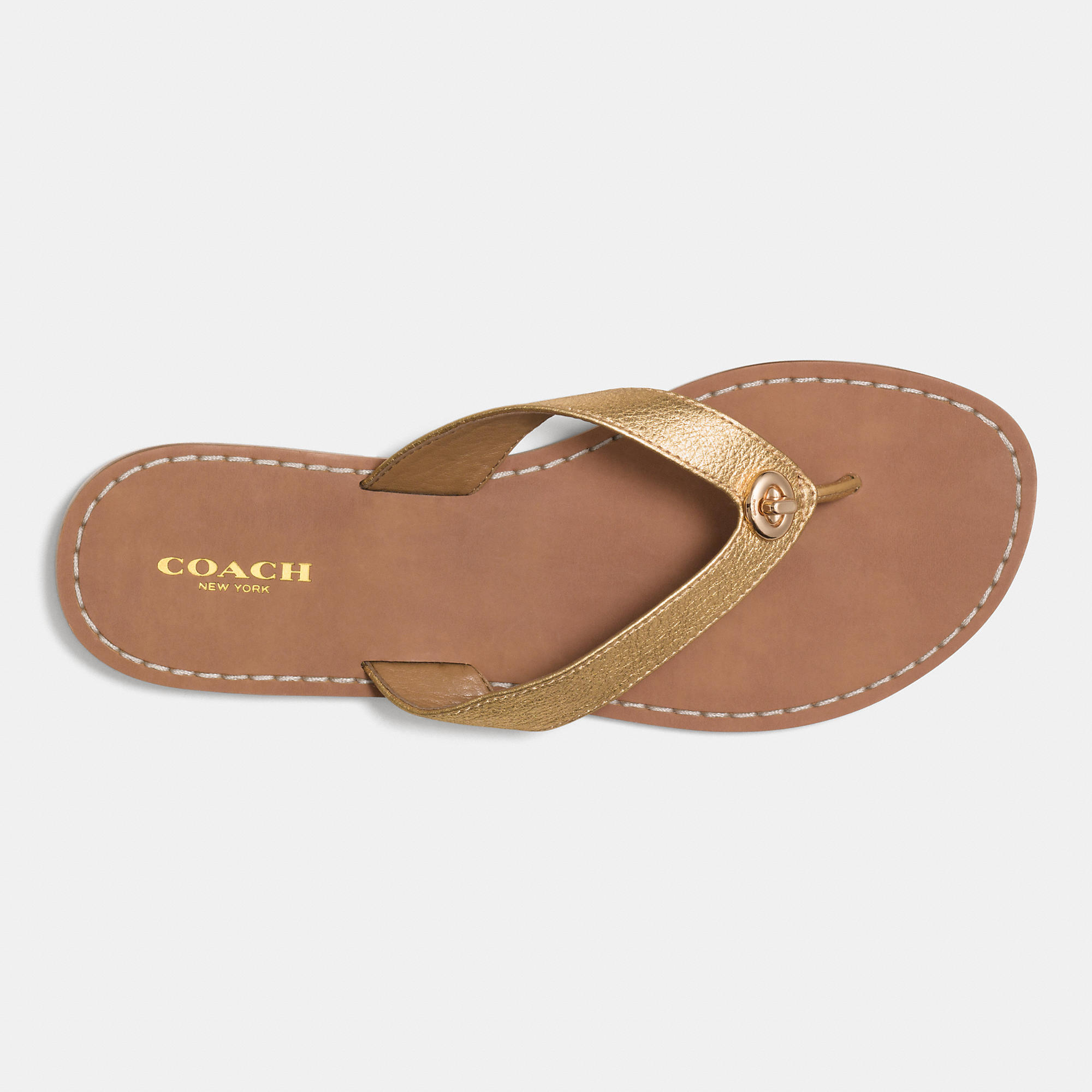 coach gold flip flops