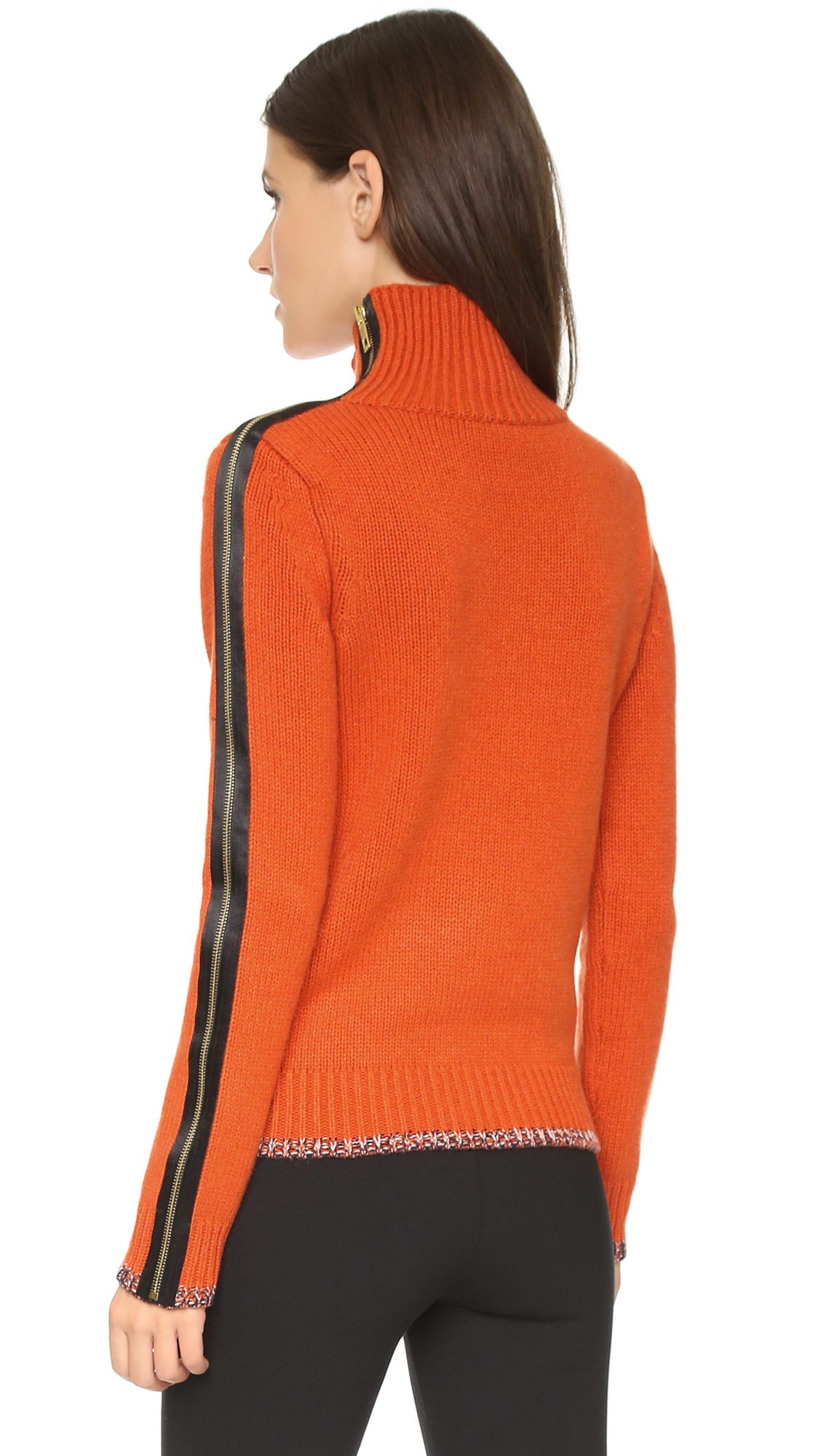 bright orange turtleneck