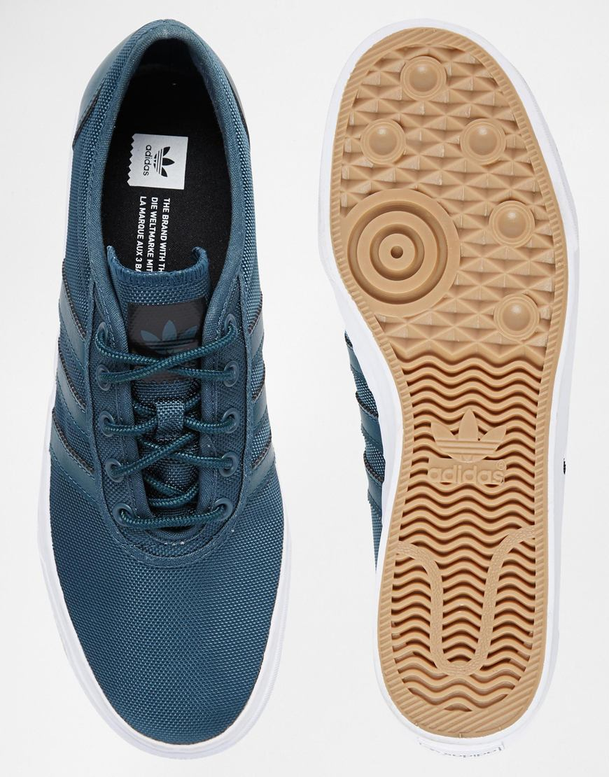 adidas blue canvas trainers