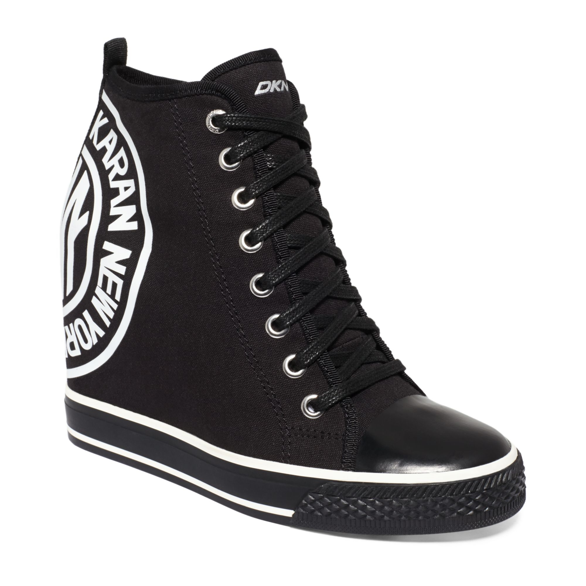 DKNY Grommet Wedge Sneakers in Black - Lyst