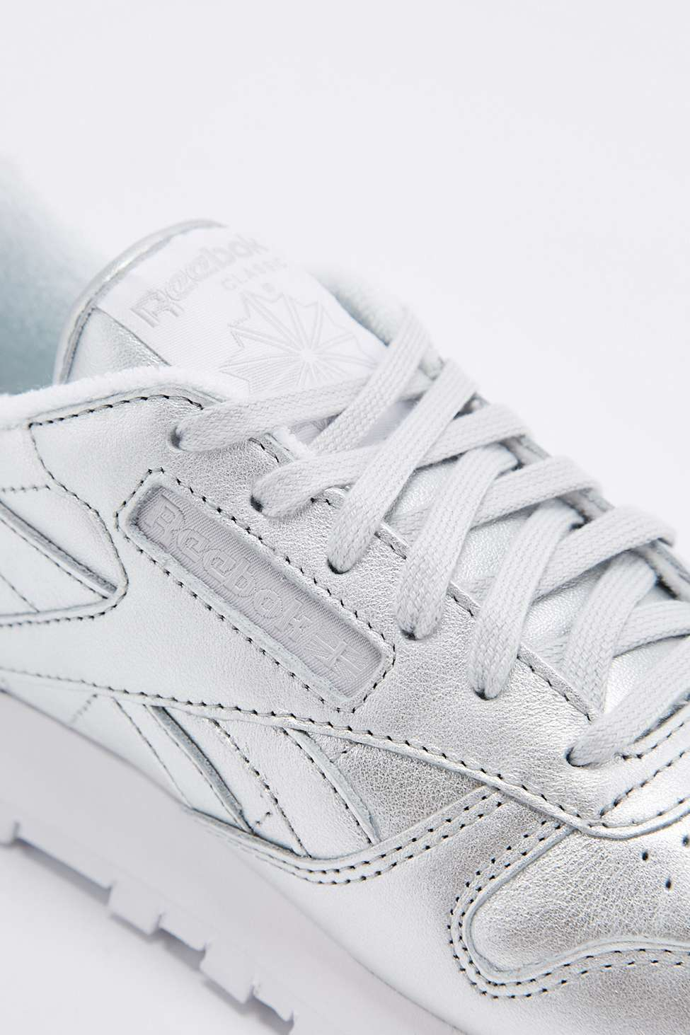 reebok trainers silver