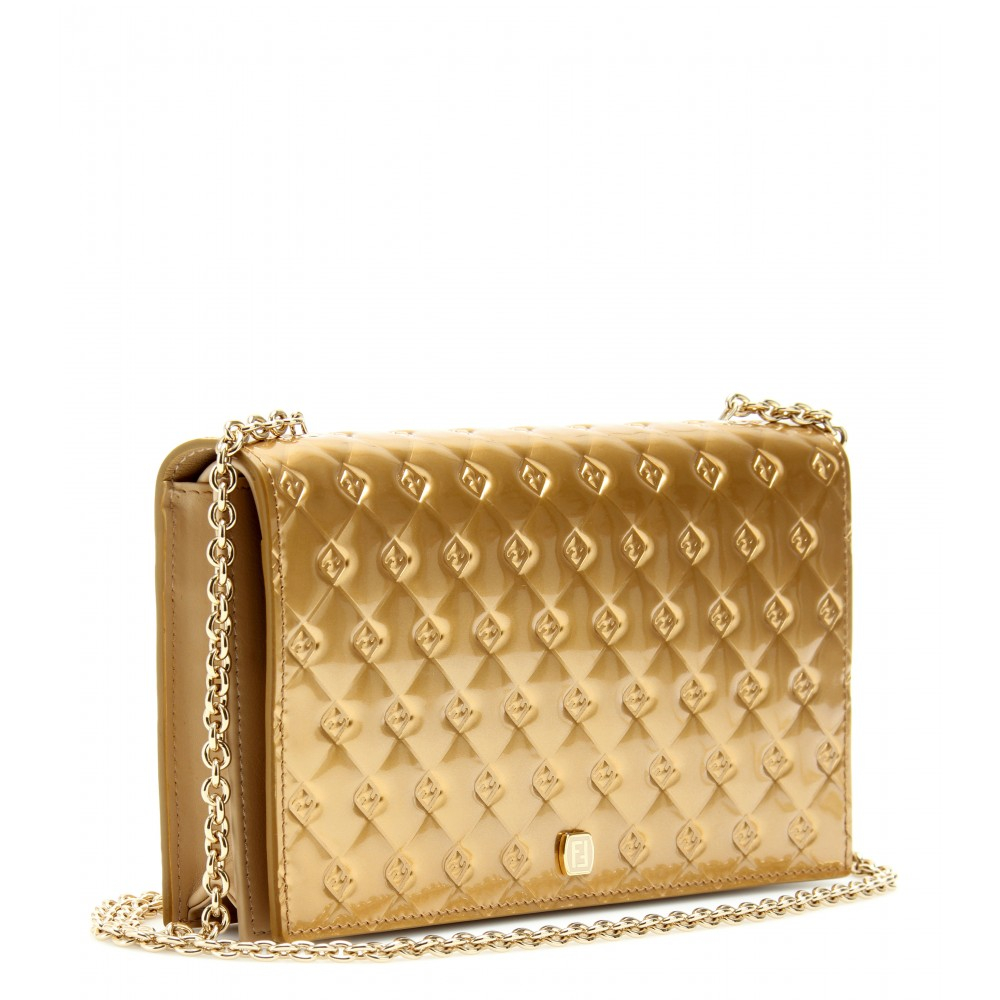 fendi gold clutch