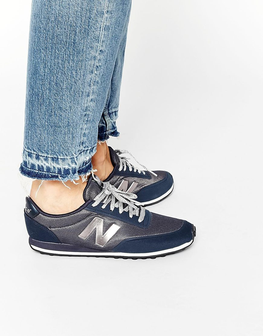 new balance 410 navy and white trainers