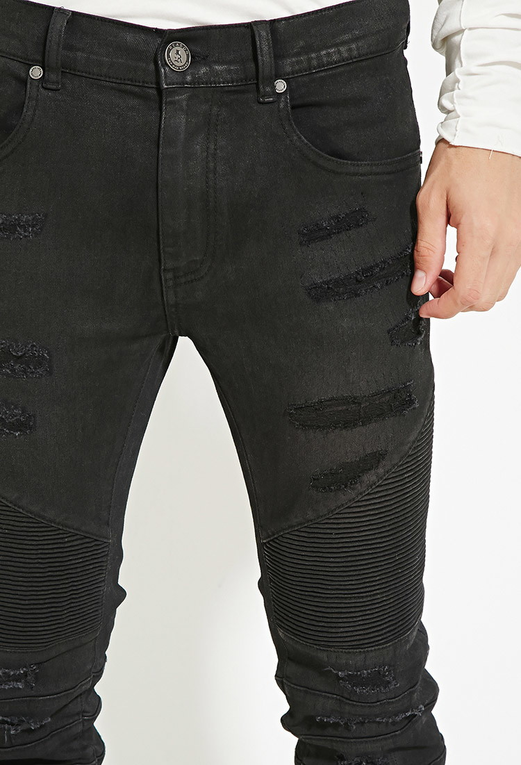 black distressed moto jeans