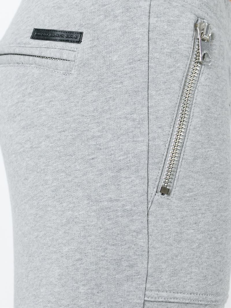 track pants with chain pockets