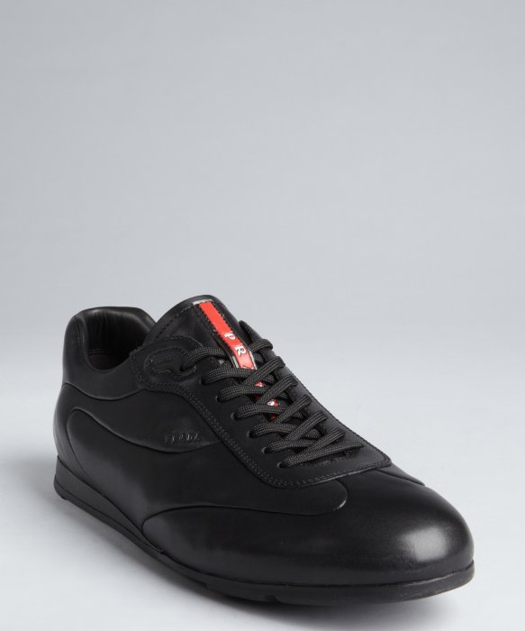 low profile black sneakers