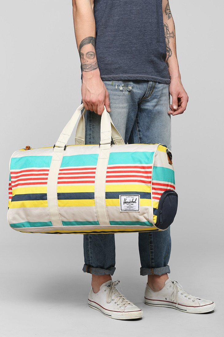 striped duffle bag