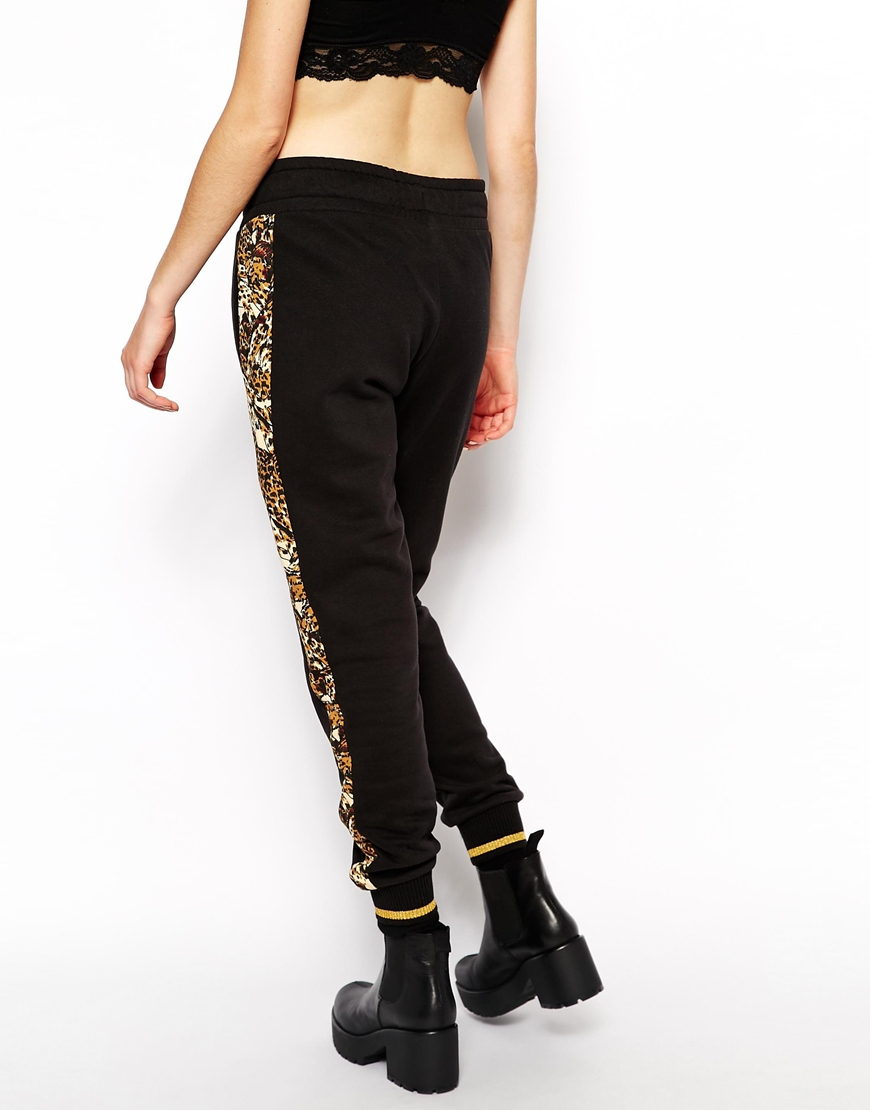 PUMA Sweat Pants with Printed Leopard Side Panel in Black | Lyst