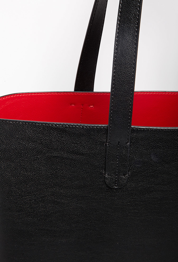 black purse with red inside