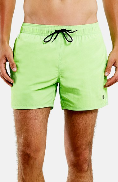 neon green swimming trunks