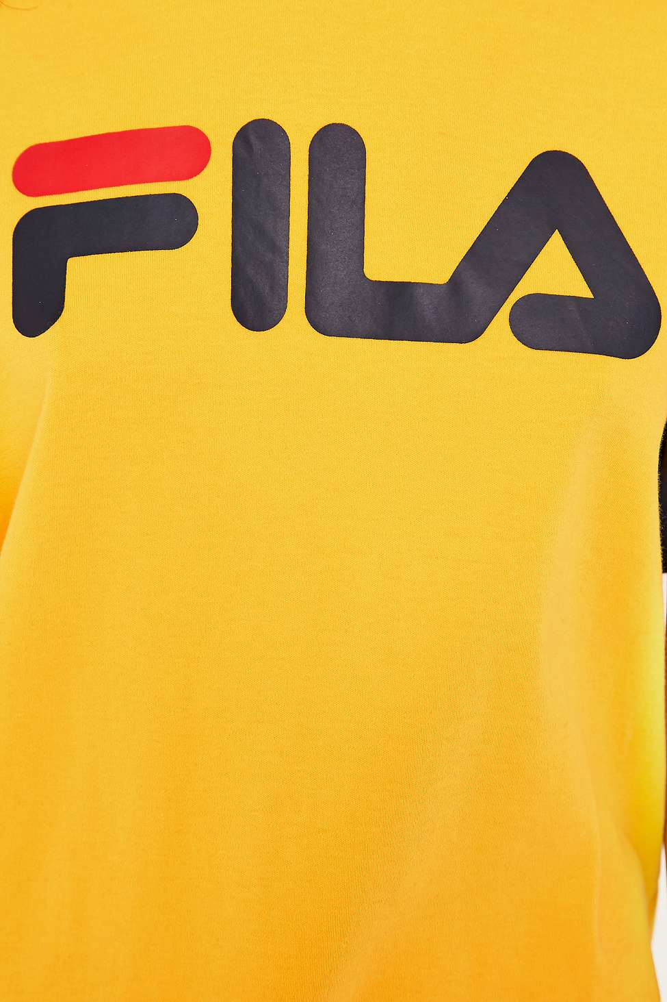 yellow and red fila shirt