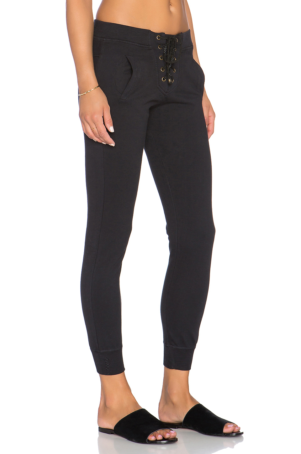 All Listings Available In Black Millenium Stretch Pants Lace Up Back Leg Detail Front Lace Up 65% Cotton 30% Nylon 5% Spandex.