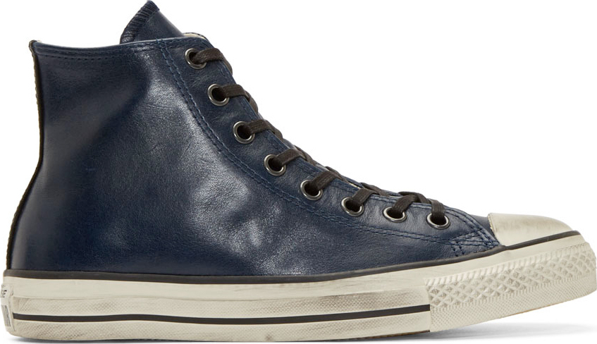 navy blue leather chuck taylors