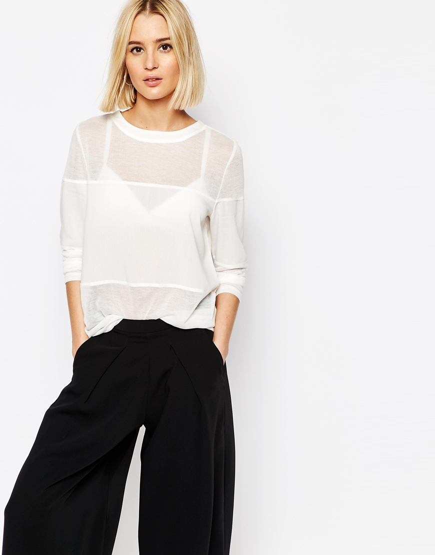 It's free shipping made easy The Lulus Love Light Black Sheer Mesh Long Sleeve Top is ready to hit the town! Sexy sheer mesh creates a rounded neckline and fitted long sleeves, atop a knit bralette with adjustable straps and exposed silver back zipper. Open back with hook and eye closure/5(29).